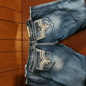 Rock Revival Distressed Blue Jeans with Embroidered Pockets
